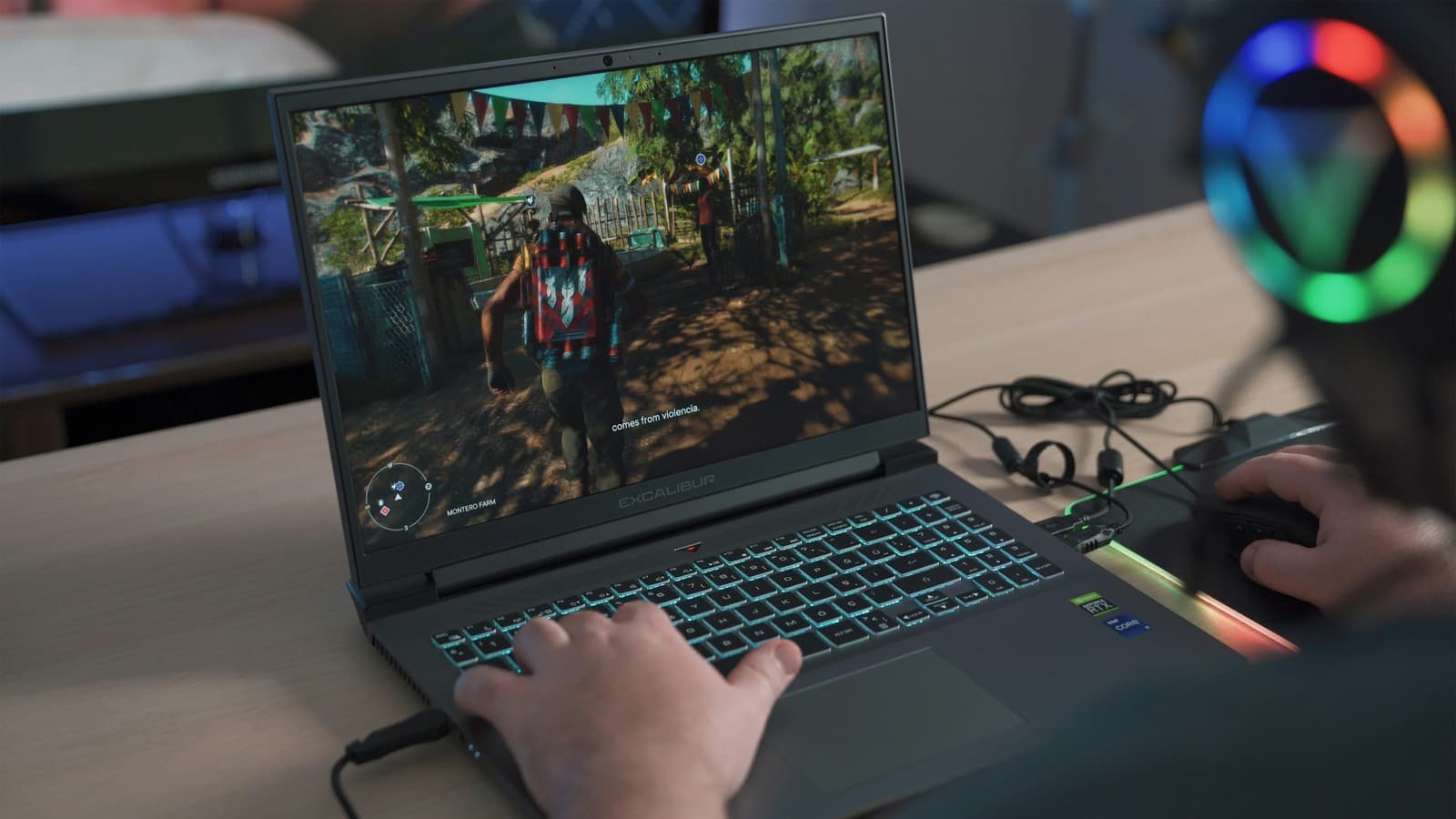 A player mid-session on a gaming laptop, hands on the keyboard and mouse.